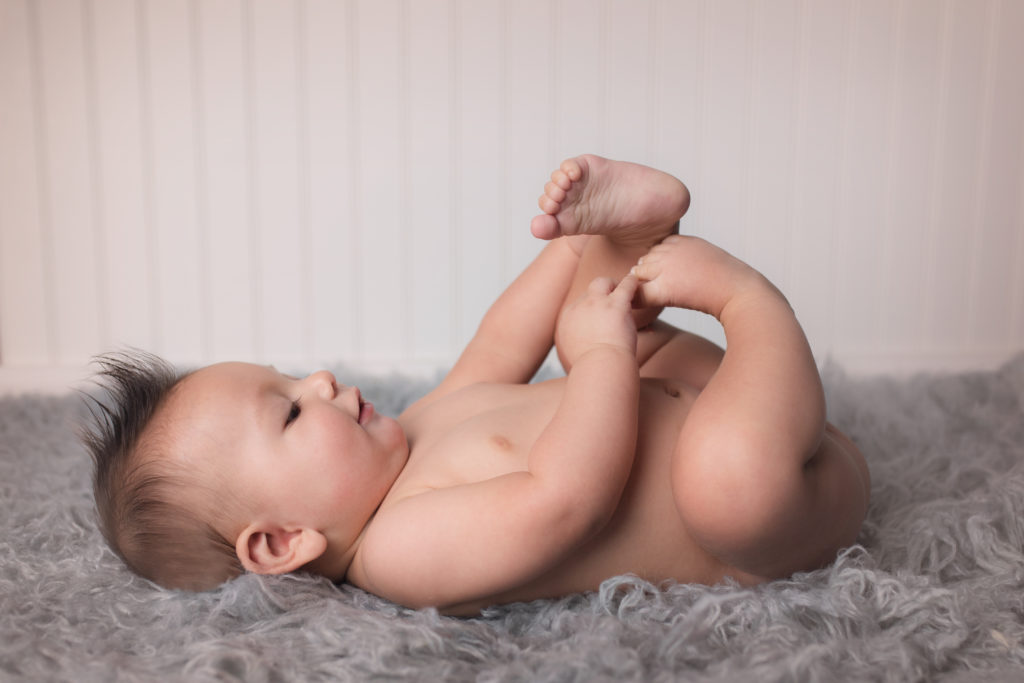 naked baby boy posed for Arvada children's photographer