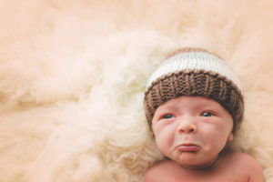 cranky baby newborn photography
